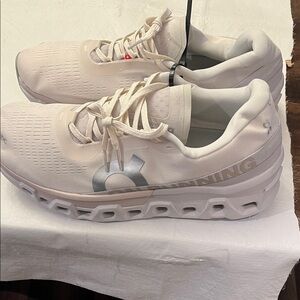 On Running Cream and Gray Athletic Shoes